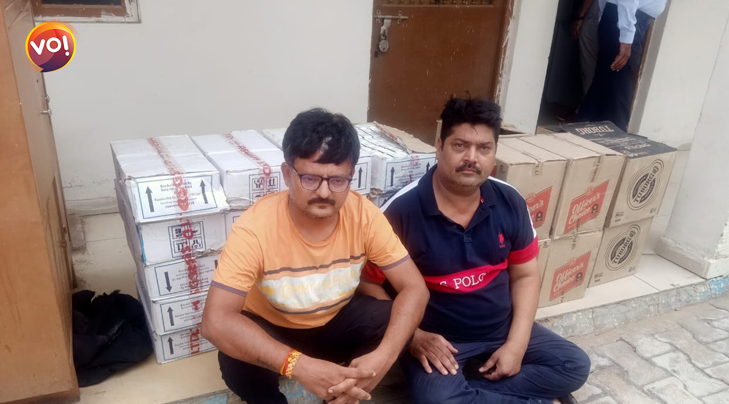 Arrest of two liquor smugglers with quantity of liquor