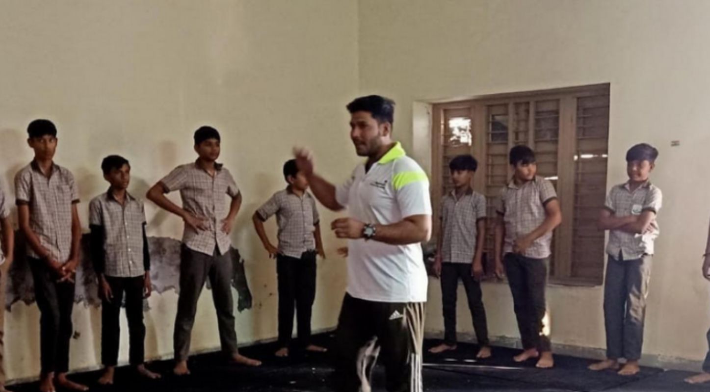 A Judo coach trains students at a government sports facility in Gujarat. Photo: Special arrangement